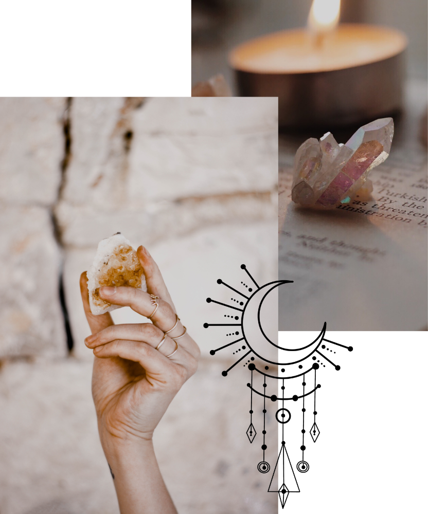 hand holding crystals wearing gold rings and pink crystal sitting on book with lit candle
